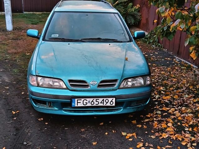 Синій Ніссан Прімера, об'ємом двигуна 1.6 л та пробігом 223 тис. км за 719 $, фото 1 на Automoto.ua