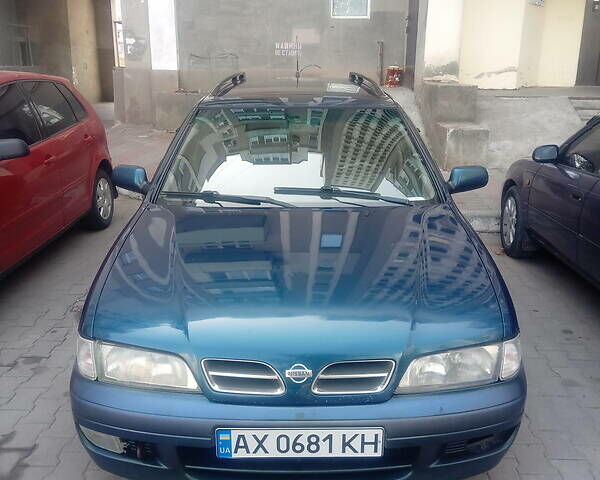 Синий Ниссан Примера, объемом двигателя 2 л и пробегом 477 тыс. км за 2800 $, фото 1 на Automoto.ua