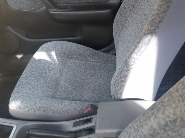 Синий Ниссан Примера, объемом двигателя 1.6 л и пробегом 390 тыс. км за 1000 $, фото 4 на Automoto.ua