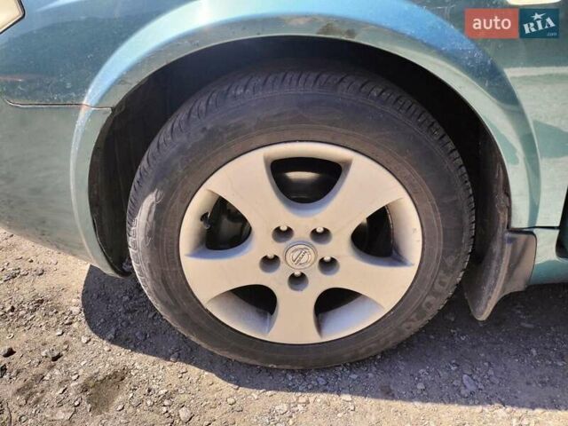 Синій Ніссан Прімера, об'ємом двигуна 1.8 л та пробігом 155 тис. км за 4000 $, фото 3 на Automoto.ua