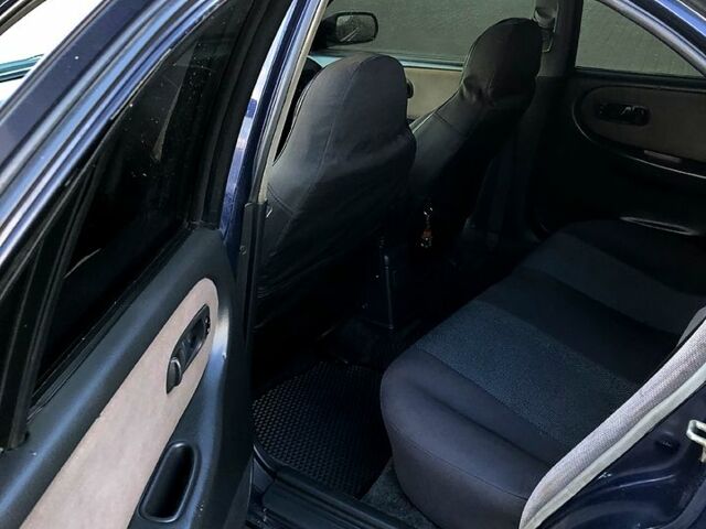 Синий Ниссан Примера, объемом двигателя 1.6 л и пробегом 316 тыс. км за 2000 $, фото 6 на Automoto.ua