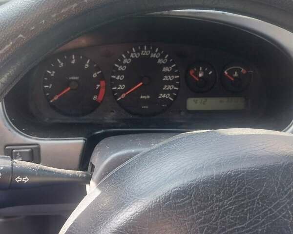 Синий Ниссан Примера, объемом двигателя 1.8 л и пробегом 300 тыс. км за 2200 $, фото 6 на Automoto.ua