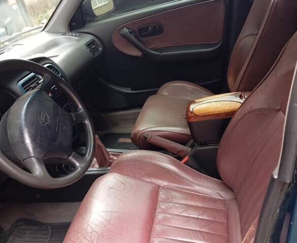 Зелений Ніссан Прімера, об'ємом двигуна 2 л та пробігом 288 тис. км за 1600 $, фото 1 на Automoto.ua