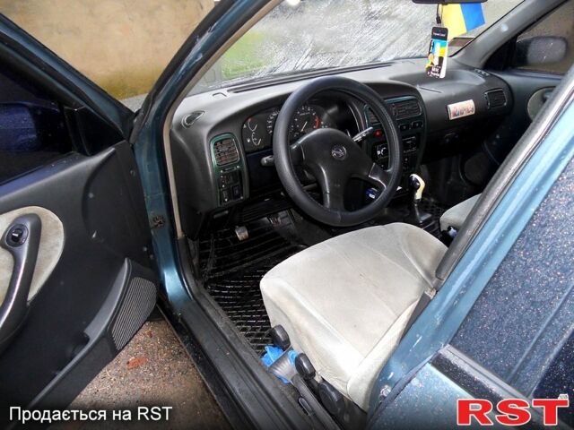 Зеленый Ниссан Примера, объемом двигателя 1.6 л и пробегом 285 тыс. км за 2000 $, фото 4 на Automoto.ua