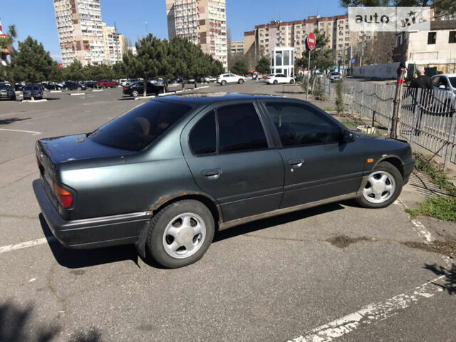 Зелений Ніссан Прімера, об'ємом двигуна 1.6 л та пробігом 320 тис. км за 1900 $, фото 13 на Automoto.ua