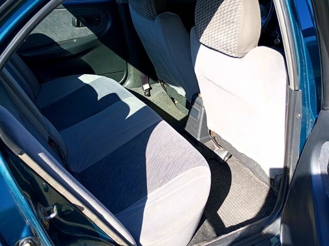 Зелений Ніссан Прімера, об'ємом двигуна 1.6 л та пробігом 400 тис. км за 1400 $, фото 6 на Automoto.ua