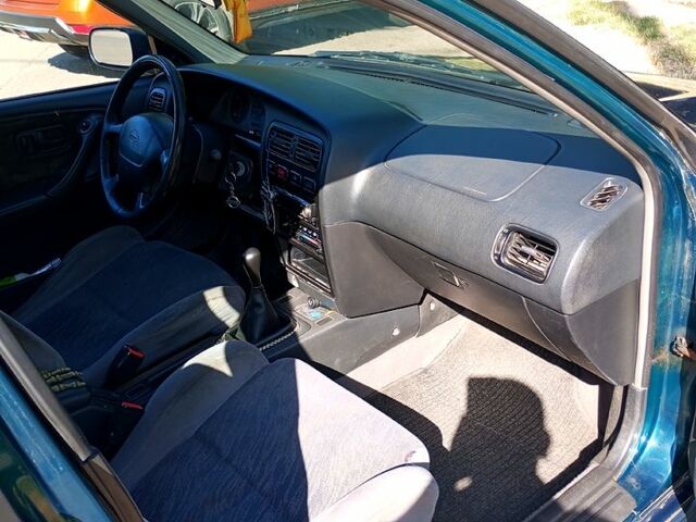 Зелений Ніссан Прімера, об'ємом двигуна 1.6 л та пробігом 400 тис. км за 1400 $, фото 5 на Automoto.ua