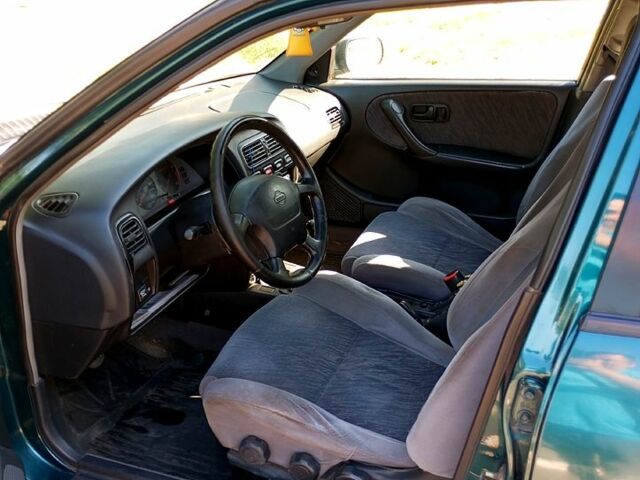 Зелений Ніссан Прімера, об'ємом двигуна 1.6 л та пробігом 400 тис. км за 1400 $, фото 3 на Automoto.ua