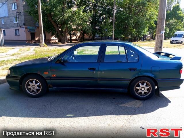 Зелений Ніссан Прімера, об'ємом двигуна 1.6 л та пробігом 400 тис. км за 1400 $, фото 9 на Automoto.ua