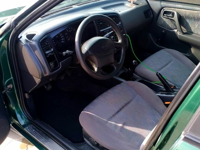 Зеленый Ниссан Примера, объемом двигателя 1.6 л и пробегом 45 тыс. км за 1000 $, фото 6 на Automoto.ua