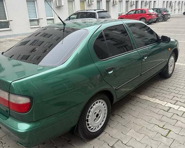 Зеленый Ниссан Примера, объемом двигателя 1.6 л и пробегом 470 тыс. км за 2800 $, фото 5 на Automoto.ua