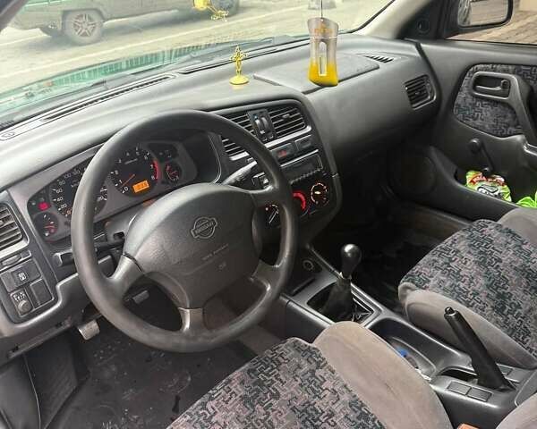 Зеленый Ниссан Примера, объемом двигателя 1.6 л и пробегом 470 тыс. км за 2800 $, фото 6 на Automoto.ua