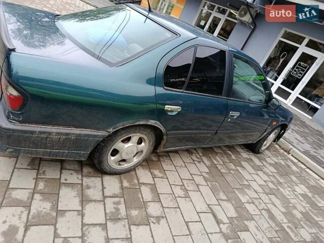 Зеленый Ниссан Примера, объемом двигателя 1.6 л и пробегом 374 тыс. км за 1500 $, фото 3 на Automoto.ua