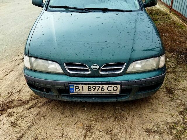 Зеленый Ниссан Примера, объемом двигателя 2 л и пробегом 200 тыс. км за 1850 $, фото 1 на Automoto.ua