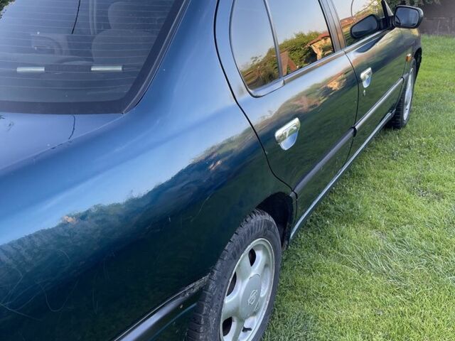 Зеленый Ниссан Примера, объемом двигателя 1.6 л и пробегом 280 тыс. км за 1400 $, фото 8 на Automoto.ua