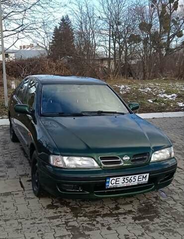 Зеленый Ниссан Примера, объемом двигателя 2 л и пробегом 397 тыс. км за 1800 $, фото 3 на Automoto.ua