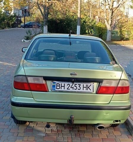 Зелений Ніссан Прімера, об'ємом двигуна 1.6 л та пробігом 318 тис. км за 2800 $, фото 1 на Automoto.ua