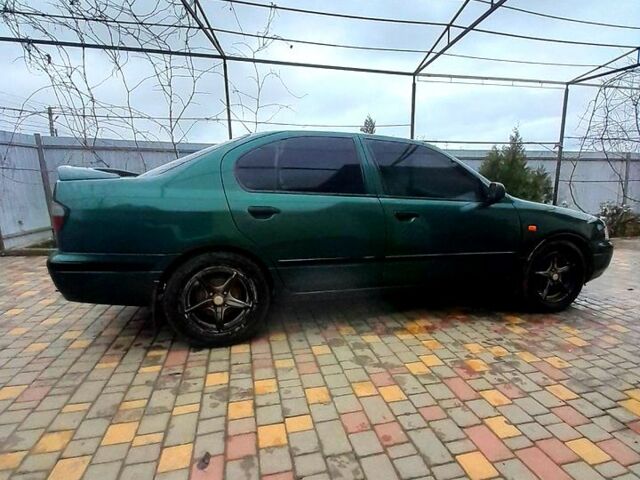 Зелений Ніссан Прімера, об'ємом двигуна 1.6 л та пробігом 0 тис. км за 2300 $, фото 4 на Automoto.ua
