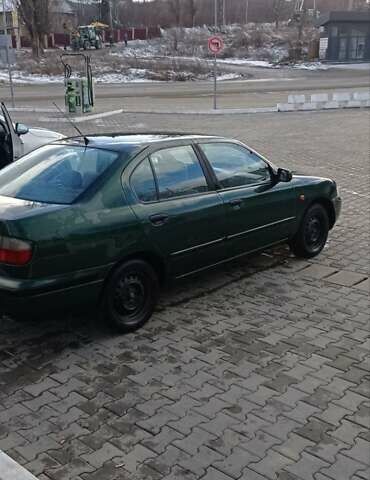 Зеленый Ниссан Примера, объемом двигателя 2 л и пробегом 397 тыс. км за 1800 $, фото 8 на Automoto.ua