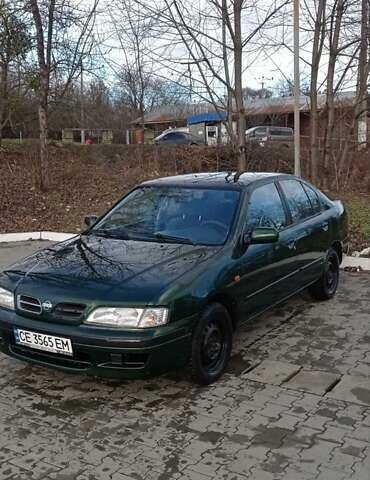 Зеленый Ниссан Примера, объемом двигателя 2 л и пробегом 397 тыс. км за 1800 $, фото 2 на Automoto.ua