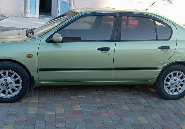 Зелений Ніссан Прімера, об'ємом двигуна 1.6 л та пробігом 318 тис. км за 2800 $, фото 3 на Automoto.ua