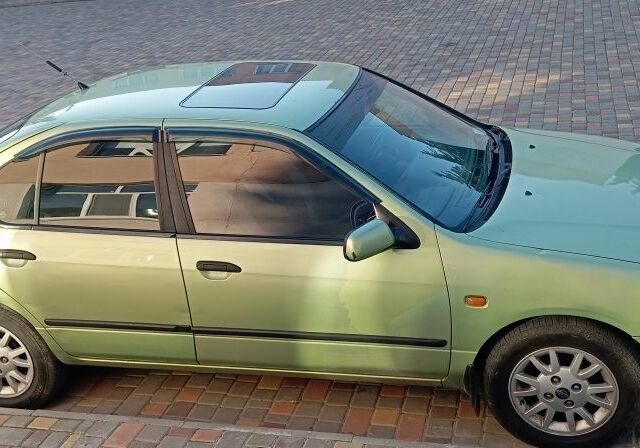 Зелений Ніссан Прімера, об'ємом двигуна 1.6 л та пробігом 318 тис. км за 2800 $, фото 5 на Automoto.ua