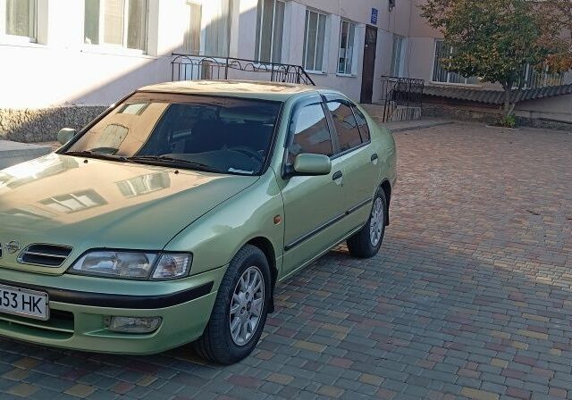Зелений Ніссан Прімера, об'ємом двигуна 1.6 л та пробігом 318 тис. км за 2800 $, фото 4 на Automoto.ua