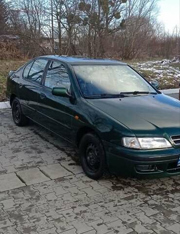 Зеленый Ниссан Примера, объемом двигателя 2 л и пробегом 397 тыс. км за 1800 $, фото 4 на Automoto.ua
