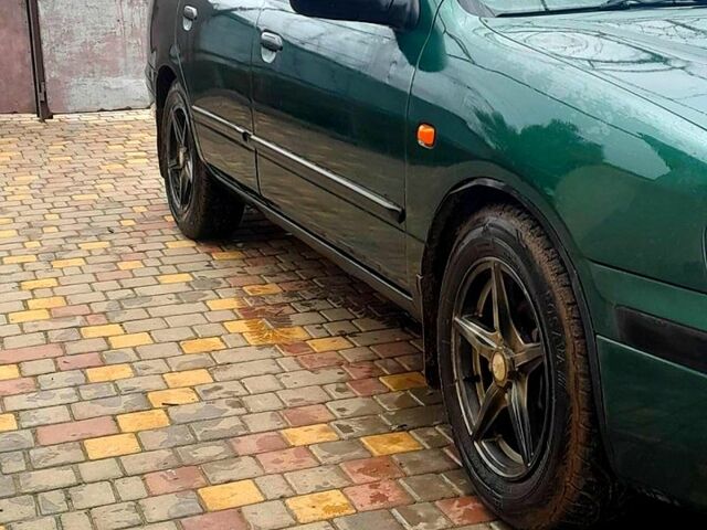 Зелений Ніссан Прімера, об'ємом двигуна 1.6 л та пробігом 0 тис. км за 2300 $, фото 5 на Automoto.ua