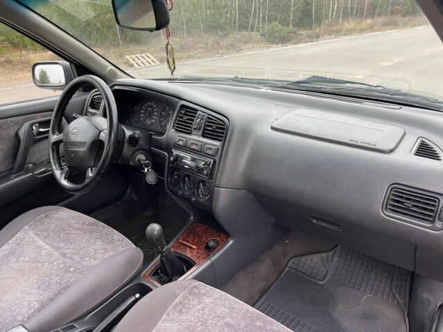 Зелений Ніссан Прімера, об'ємом двигуна 2 л та пробігом 300 тис. км за 1300 $, фото 5 на Automoto.ua