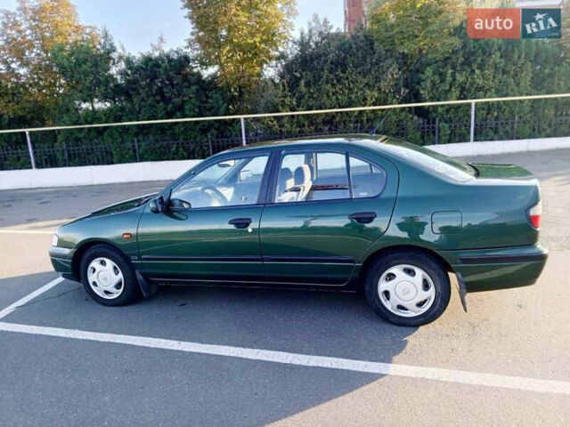 Зелений Ніссан Прімера, об'ємом двигуна 2 л та пробігом 220 тис. км за 3300 $, фото 4 на Automoto.ua
