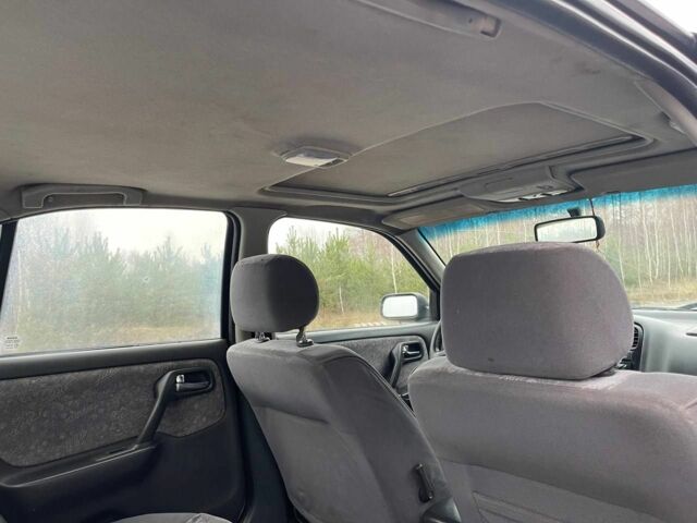 Зелений Ніссан Прімера, об'ємом двигуна 2 л та пробігом 300 тис. км за 1300 $, фото 6 на Automoto.ua