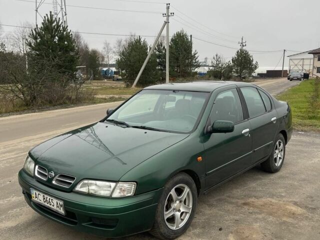 Зелений Ніссан Прімера, об'ємом двигуна 2 л та пробігом 300 тис. км за 1300 $, фото 1 на Automoto.ua