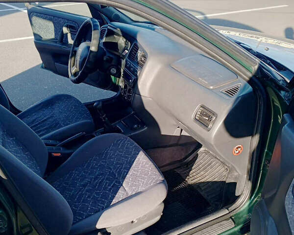 Зелений Ніссан Прімера, об'ємом двигуна 2 л та пробігом 220 тис. км за 3300 $, фото 14 на Automoto.ua