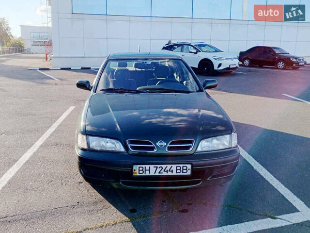 Зелений Ніссан Прімера, об'ємом двигуна 2 л та пробігом 220 тис. км за 3300 $, фото 1 на Automoto.ua