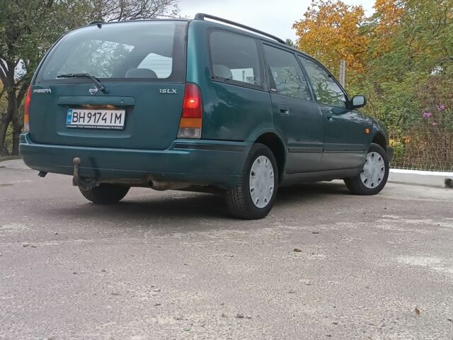 Зелений Ніссан Прімера, об'ємом двигуна 1.6 л та пробігом 225 тис. км за 1499 $, фото 3 на Automoto.ua