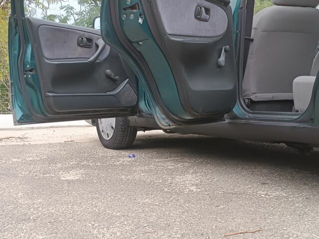 Зелений Ніссан Прімера, об'ємом двигуна 1.6 л та пробігом 225 тис. км за 1499 $, фото 6 на Automoto.ua