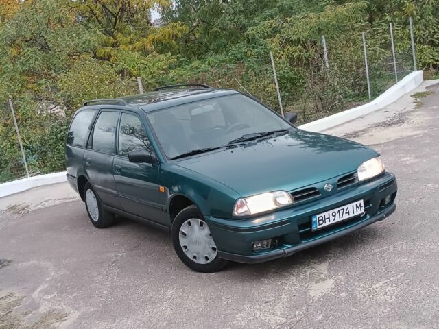 Зелений Ніссан Прімера, об'ємом двигуна 1.6 л та пробігом 225 тис. км за 1499 $, фото 17 на Automoto.ua
