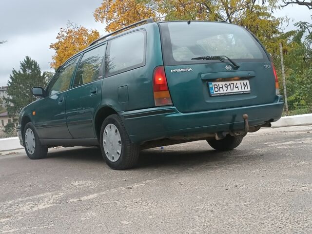 Зелений Ніссан Прімера, об'ємом двигуна 1.6 л та пробігом 225 тис. км за 1499 $, фото 4 на Automoto.ua