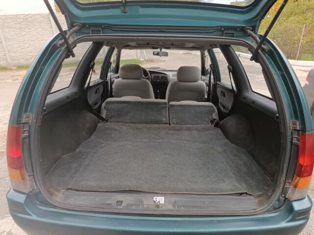 Зелений Ніссан Прімера, об'ємом двигуна 1.6 л та пробігом 225 тис. км за 1499 $, фото 10 на Automoto.ua