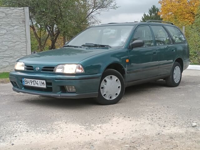 Зелений Ніссан Прімера, об'ємом двигуна 1.6 л та пробігом 225 тис. км за 1499 $, фото 1 на Automoto.ua