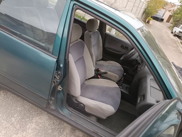 Зелений Ніссан Прімера, об'ємом двигуна 1.6 л та пробігом 225 тис. км за 1499 $, фото 13 на Automoto.ua