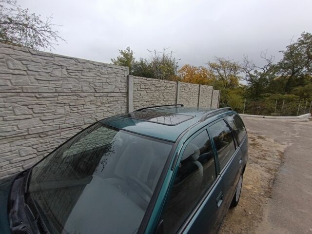 Зелений Ніссан Прімера, об'ємом двигуна 1.6 л та пробігом 225 тис. км за 1499 $, фото 9 на Automoto.ua