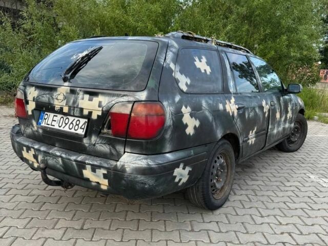 Зеленый Ниссан Примера, объемом двигателя 1.9 л и пробегом 390 тыс. км за 1100 $, фото 2 на Automoto.ua