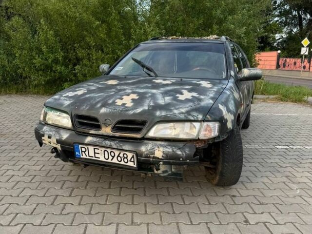 Зеленый Ниссан Примера, объемом двигателя 1.9 л и пробегом 390 тыс. км за 1100 $, фото 1 на Automoto.ua