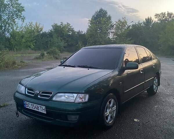 Зеленый Ниссан Примера, объемом двигателя 2 л и пробегом 340 тыс. км за 2200 $, фото 2 на Automoto.ua