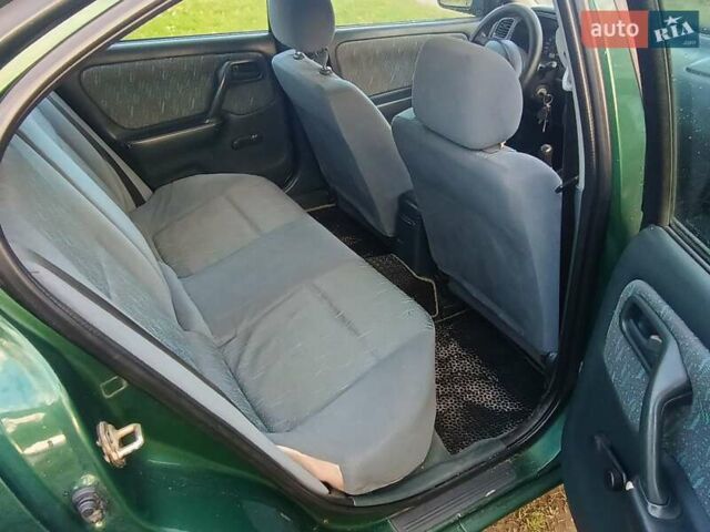 Зелений Ніссан Прімера, об'ємом двигуна 2 л та пробігом 315 тис. км за 2700 $, фото 1 на Automoto.ua
