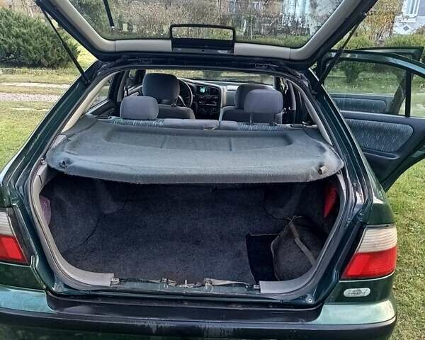 Зелений Ніссан Прімера, об'ємом двигуна 2 л та пробігом 315 тис. км за 2700 $, фото 5 на Automoto.ua