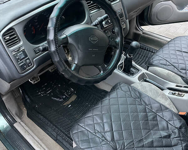 Зелений Ніссан Прімера, об'ємом двигуна 1.8 л та пробігом 295 тис. км за 2200 $, фото 7 на Automoto.ua