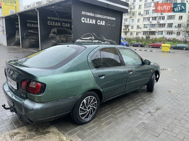 Зелений Ніссан Прімера, об'ємом двигуна 1.8 л та пробігом 295 тис. км за 2200 $, фото 5 на Automoto.ua